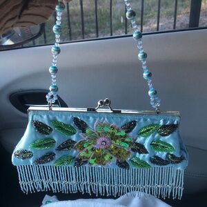 Elegant Beaded Clutch with Floral Design